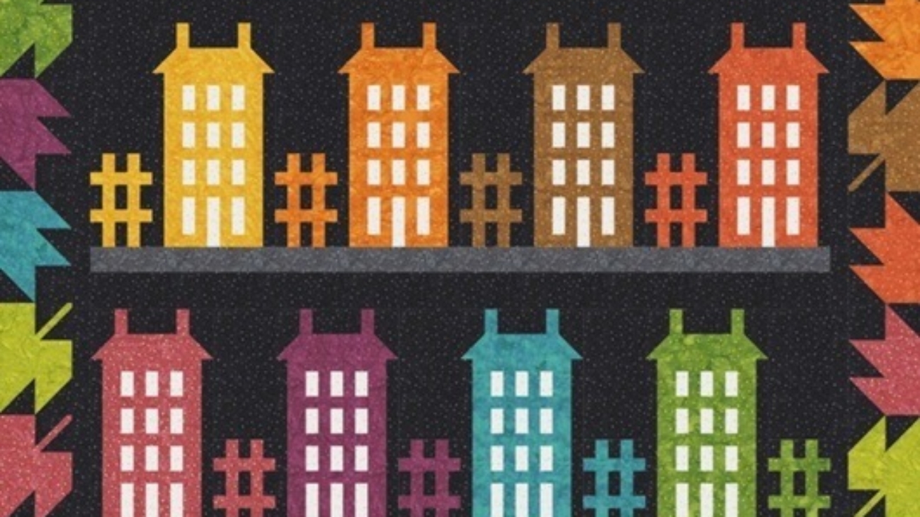 Anthology Fabrics Autumn 2025 catalogue featuring new quilting designs and vibrant fabric patterns.